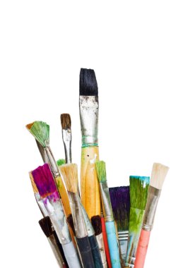 Used paint brushes isolated on white clipart