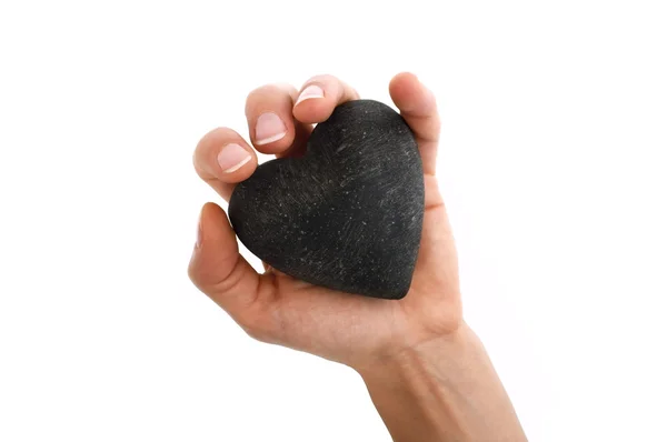 Hand som håller massage sten isolerad på vit — Stockfoto