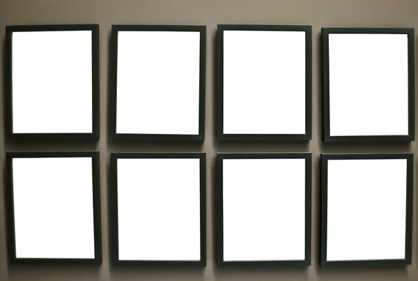 Photo frames on wall — Stock Photo, Image