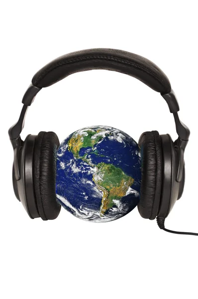 Planetjorden med hörlurar - världen musik koncept — Stockfoto