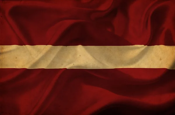 Латвия машет флагом — стоковое фото