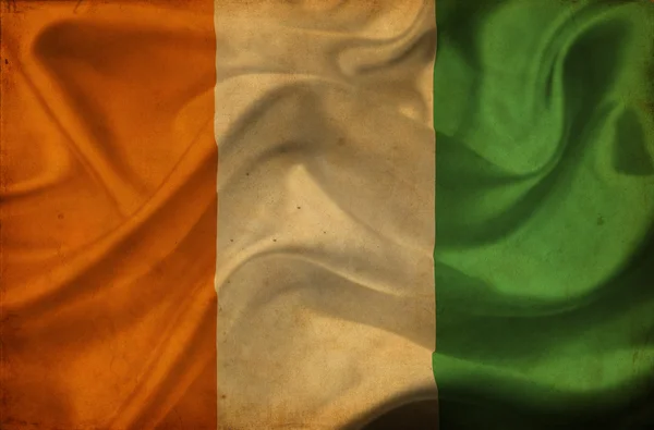Elfenbenskusten viftande flagga — Stockfoto