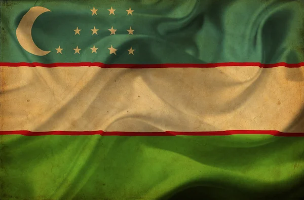Узбекистан размахивает флагом — стоковое фото