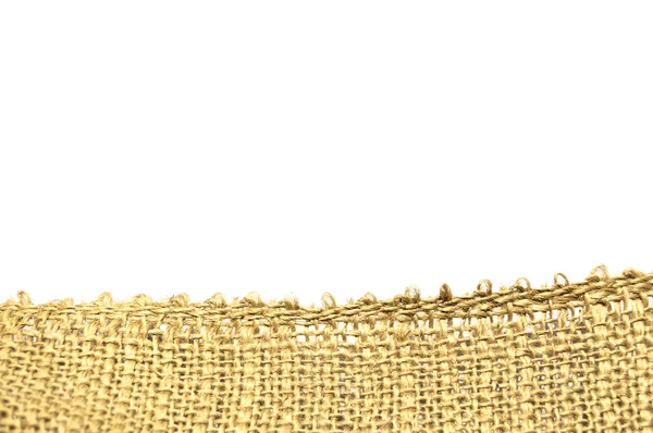 Close up of a yellow burlap isolated on white background — Stock Photo, Image