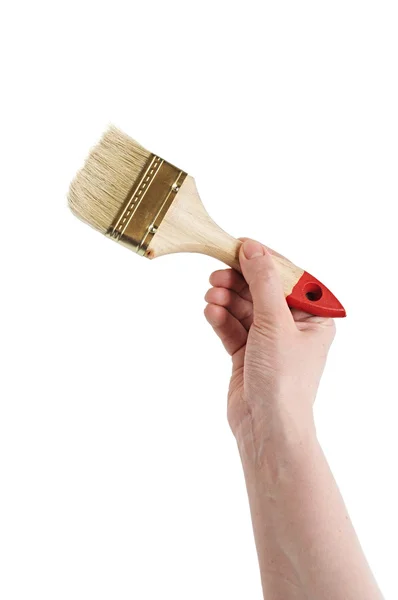 Human hand is holding paintbrush isolated on white — Stock Photo, Image