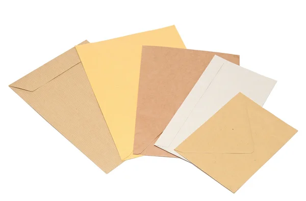 白い背景の上の杭の封筒 — ストック写真