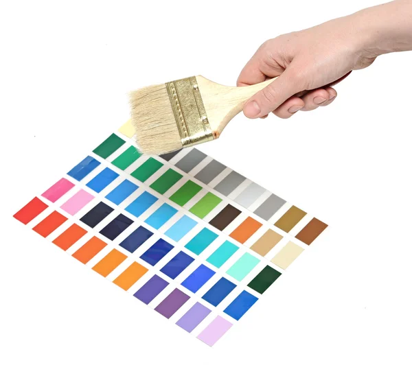 Escova com cabo de madeira na paleta de cores — Fotografia de Stock