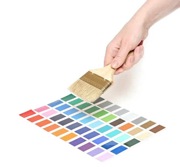 Borstel met houten greep op kleurenpalet — Stockfoto