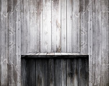 Empty wood shelf on old wall clipart