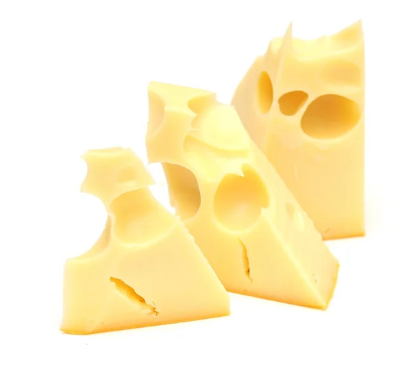 Pieces of cheese isolated on white — Stock Photo, Image