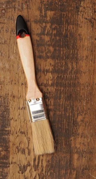Pinsel auf Holzgrund — Stockfoto