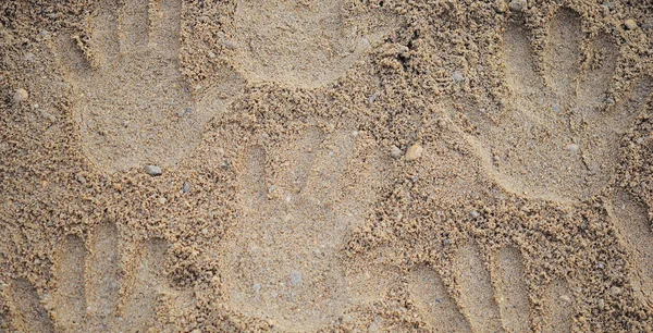 L'impronta delle mani sulla sabbia — Foto Stock