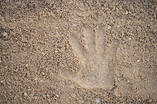 Χέρι εκτυπώσεις στην άμμο — Φωτογραφία Αρχείου