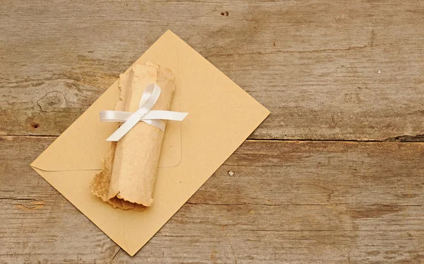 stock image Envelopes with roll old paper