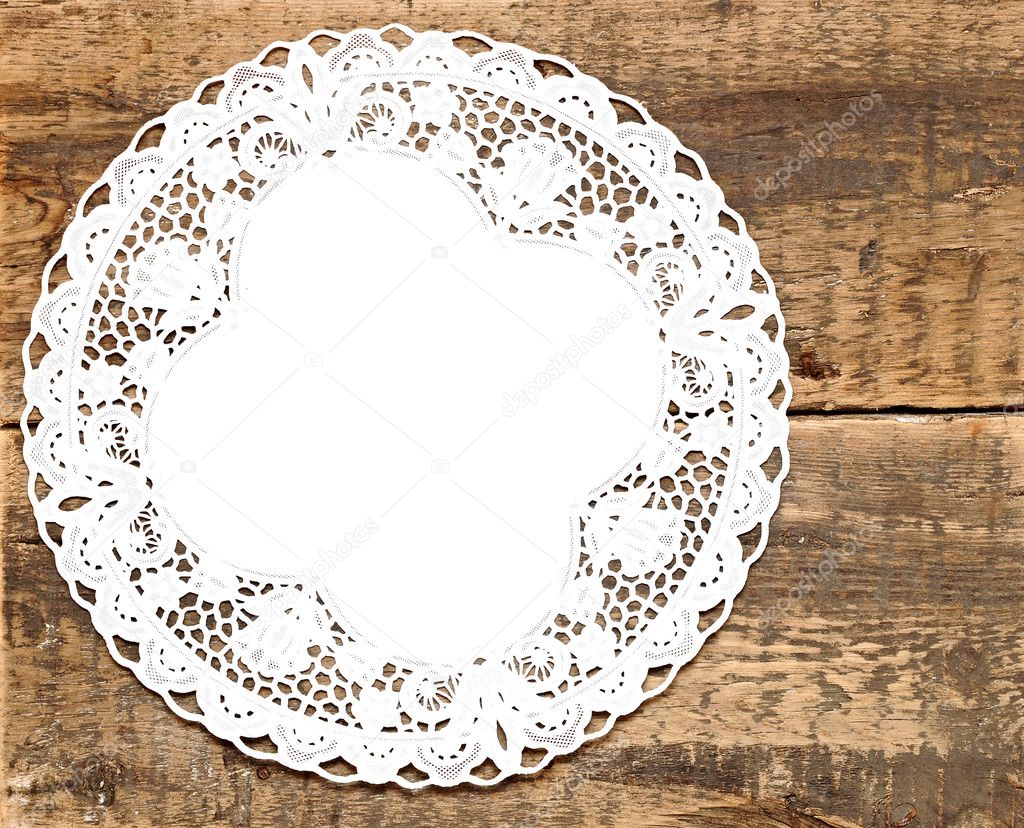 Vintage lace over wooden background with space for your text