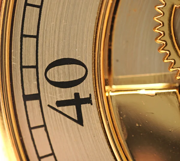 Closeup relógio dourado com engrenagens — Fotografia de Stock