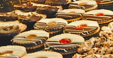 Cookies on a counter at a bakery.