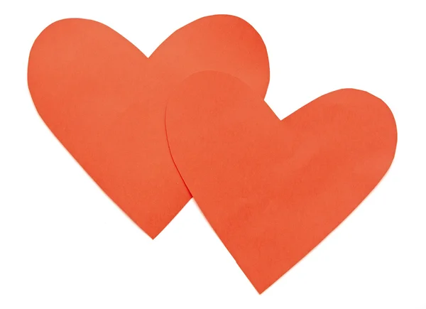 Close up de formas de coração de papel no fundo branco — Fotografia de Stock