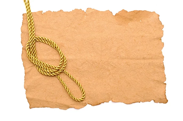Вінтажний папір з декоративною мотузкою — стокове фото