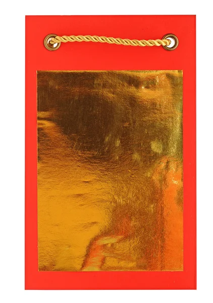 Ευχετήρια κάρτα σε κόκκινο χαρτί με χρυσό σχοινιού. χώρος για το κείμενό σας — Φωτογραφία Αρχείου