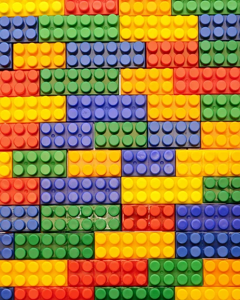 stock image Background, colorful plastic building blocks on white background