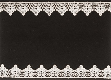 White lace on the black background clipart