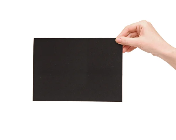 Mãos e papel preto isolados sobre fundo branco — Fotografia de Stock