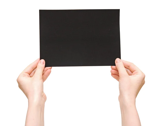 手和孤立在白色背景上的黑纸 — 图库照片