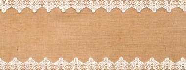 White lace on the sack background clipart