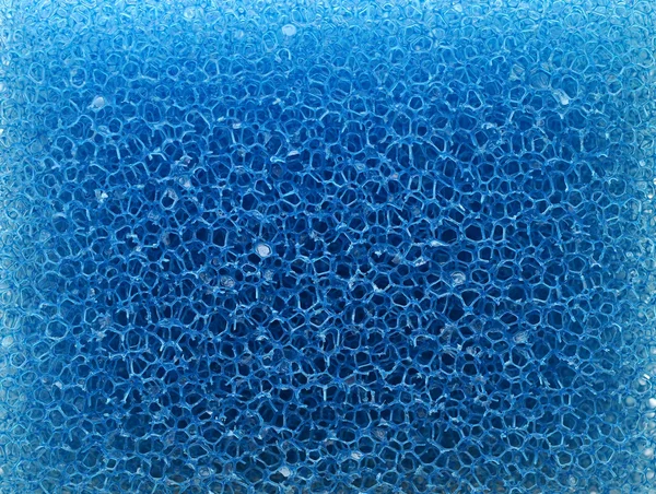 蓝色清洗海绵的特写。背景或纹理 — 图库照片