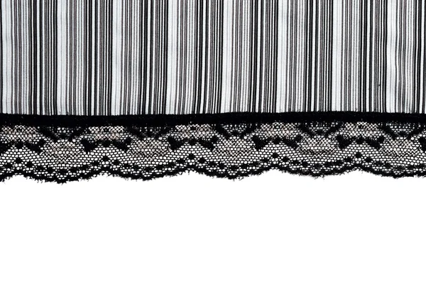 Декоративные черные кружева на изолированном белом фоне — стоковое фото