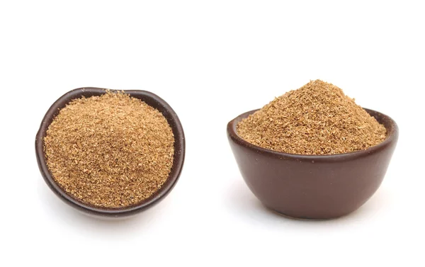 Coriander powder in a clay bowl — Stock Photo, Image