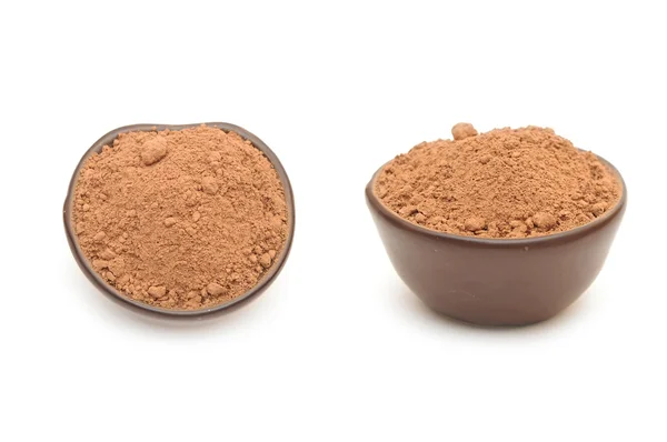 Cocoa powder in a clay bowl — Stock Photo, Image