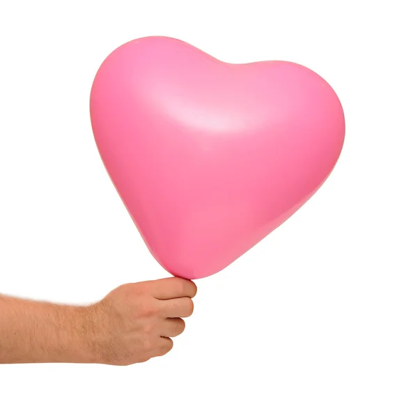 Red balloon in hand — Stock Photo, Image