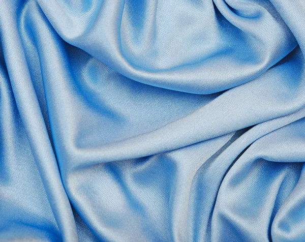 Hladké elegantní modré hedvábné pozadí, můžete použít jako pozadí — Stock fotografie