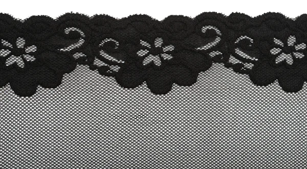 Encaje negro con patrón con forma de flor sobre fondo blanco —  Fotos de Stock