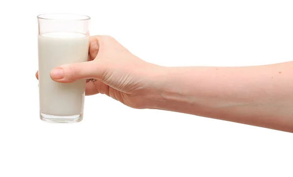 Mano con bicchiere di latte — Foto Stock