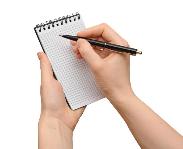 Human hand take a note on blank notepad Royalty Free Stock Images