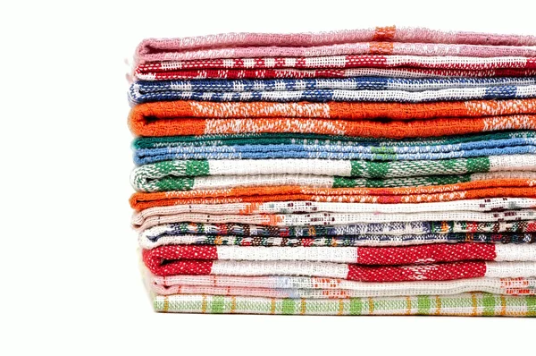Pile di asciugamani da cucina in lino su sfondo bianco. spazio per yo — Foto Stock