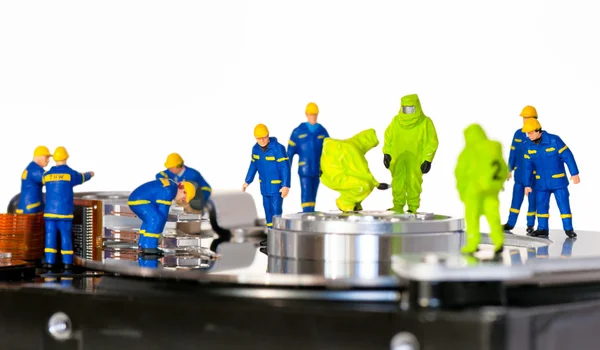 Team of technicians repair hard disk — Stock Photo, Image