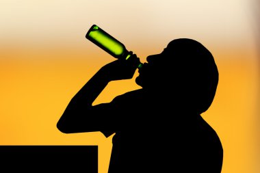 Silhouette of drinking man clipart