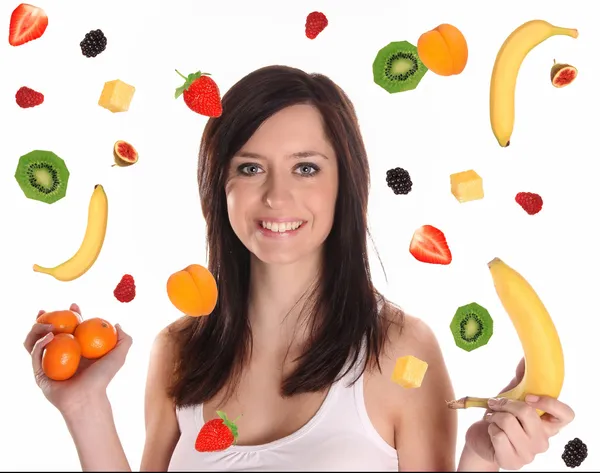Jonge brunette vrouw met dalende fruit over Wit — Stockfoto