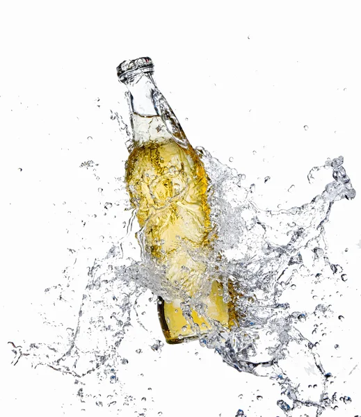 Beer bottle with splashing water — Stock Photo, Image