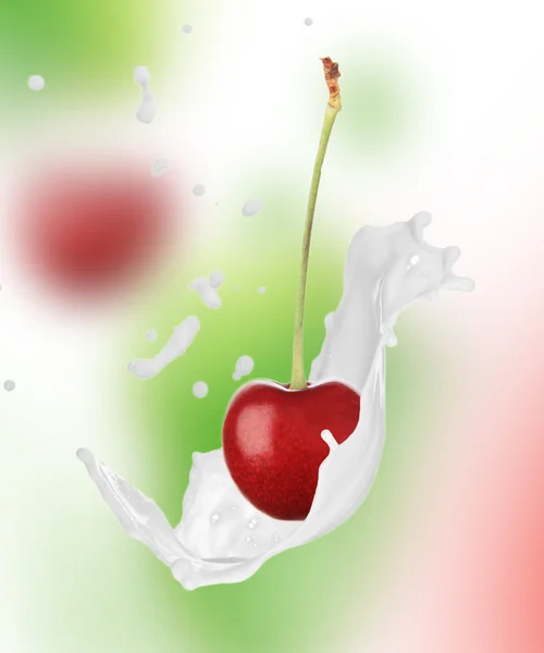 Cherry in cream splash — Stock Photo, Image