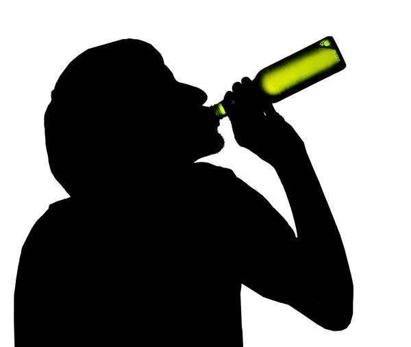 stock image Silhouette of drinking man