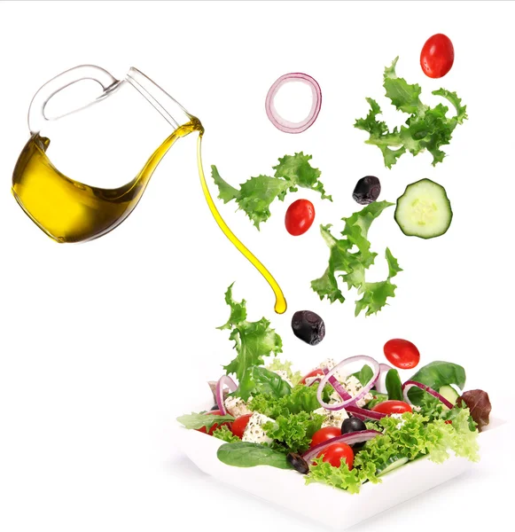 stock image Fresh salad with poured olive oil