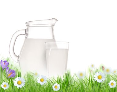 Milk jug and glass on the grass with chamomiles flowers over white clipart