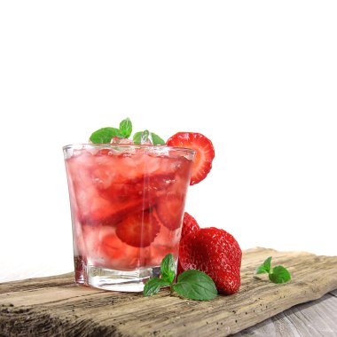 Fruit cocktail over wooden background