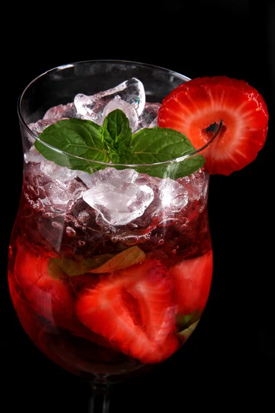 Strawberry cocktail over black background — Stock Photo, Image