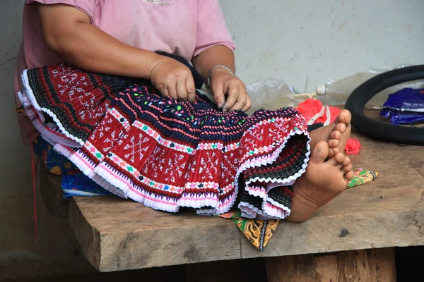 Sewing ethnic costume — Stock Photo, Image